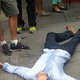 An unidentified man was knocked out after hurling a racial slur at a black diner in New York City. (Twitter E Nasty)
